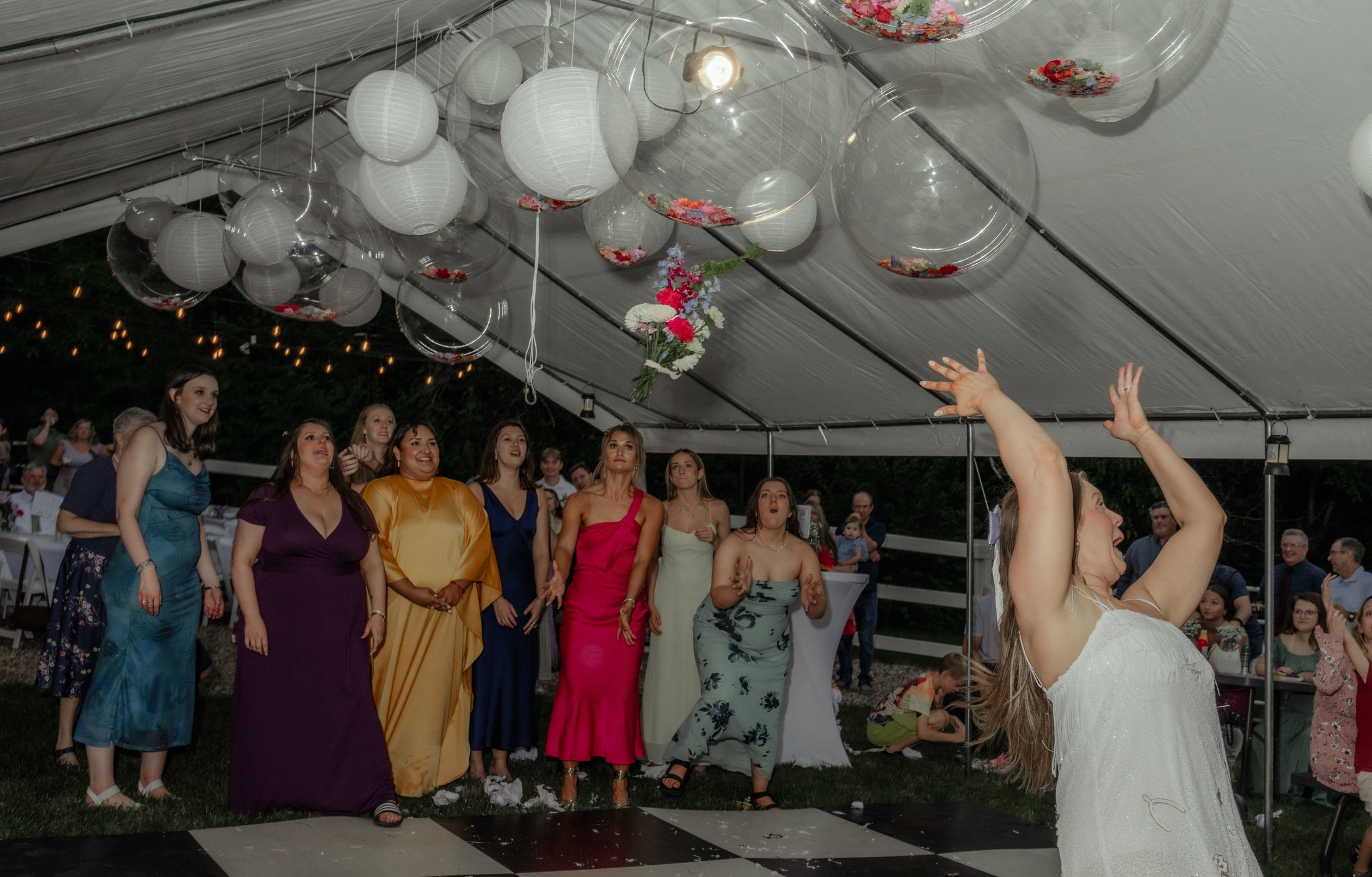 Wedding celebration under the tent at Bella's Farmhouse